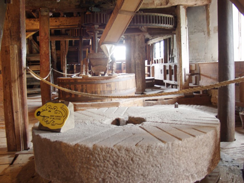 An exposed Mill Stone, Houghton Mill, Houghton, Huntingdonshire, England, Great Britain